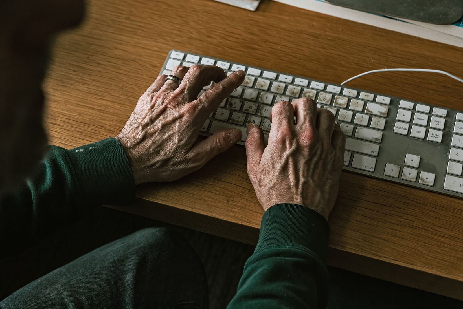 Image may contain Computer Computer Hardware Computer Keyboard Electronics Hardware Person Skin and Adult