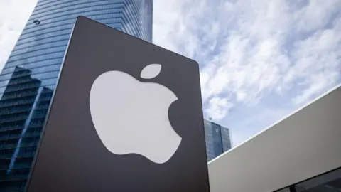 Getty Images Apple's logo shown on a store front in Malaysia